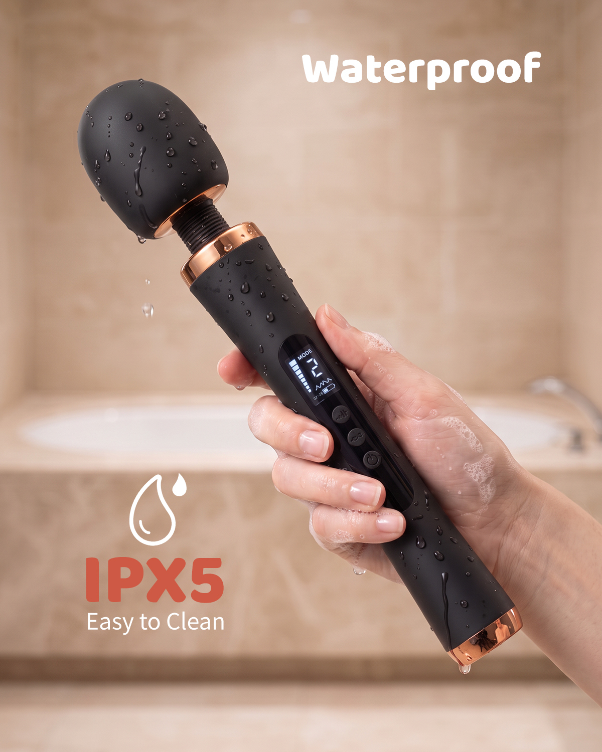 Black UXIJOV App-Controlled Wand shown with water droplets in a warm bathroom setting
